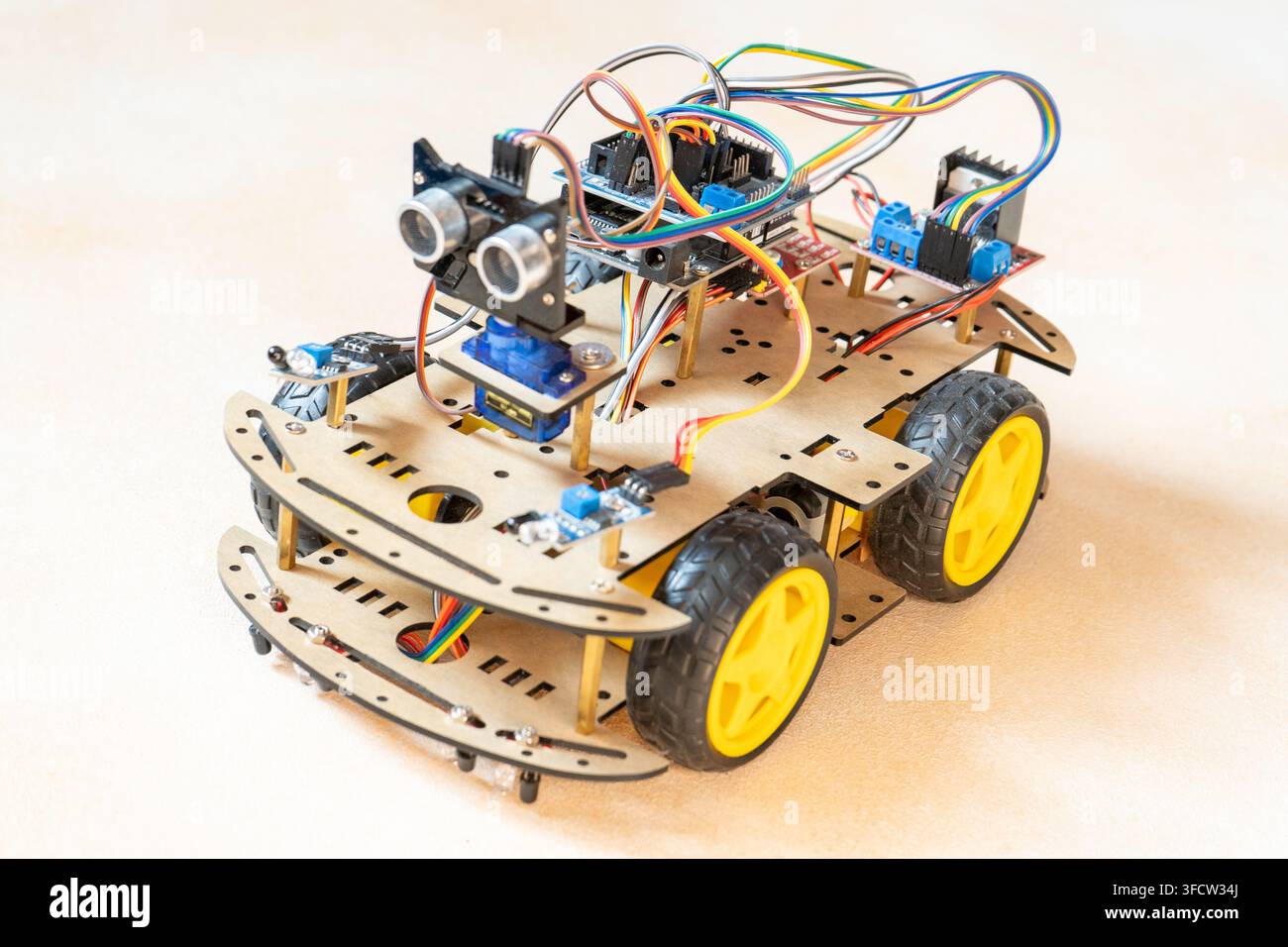 DIY Robot Car Assembly and Components. Educational electronics project for STEM learning and study robotics. Stock Photo