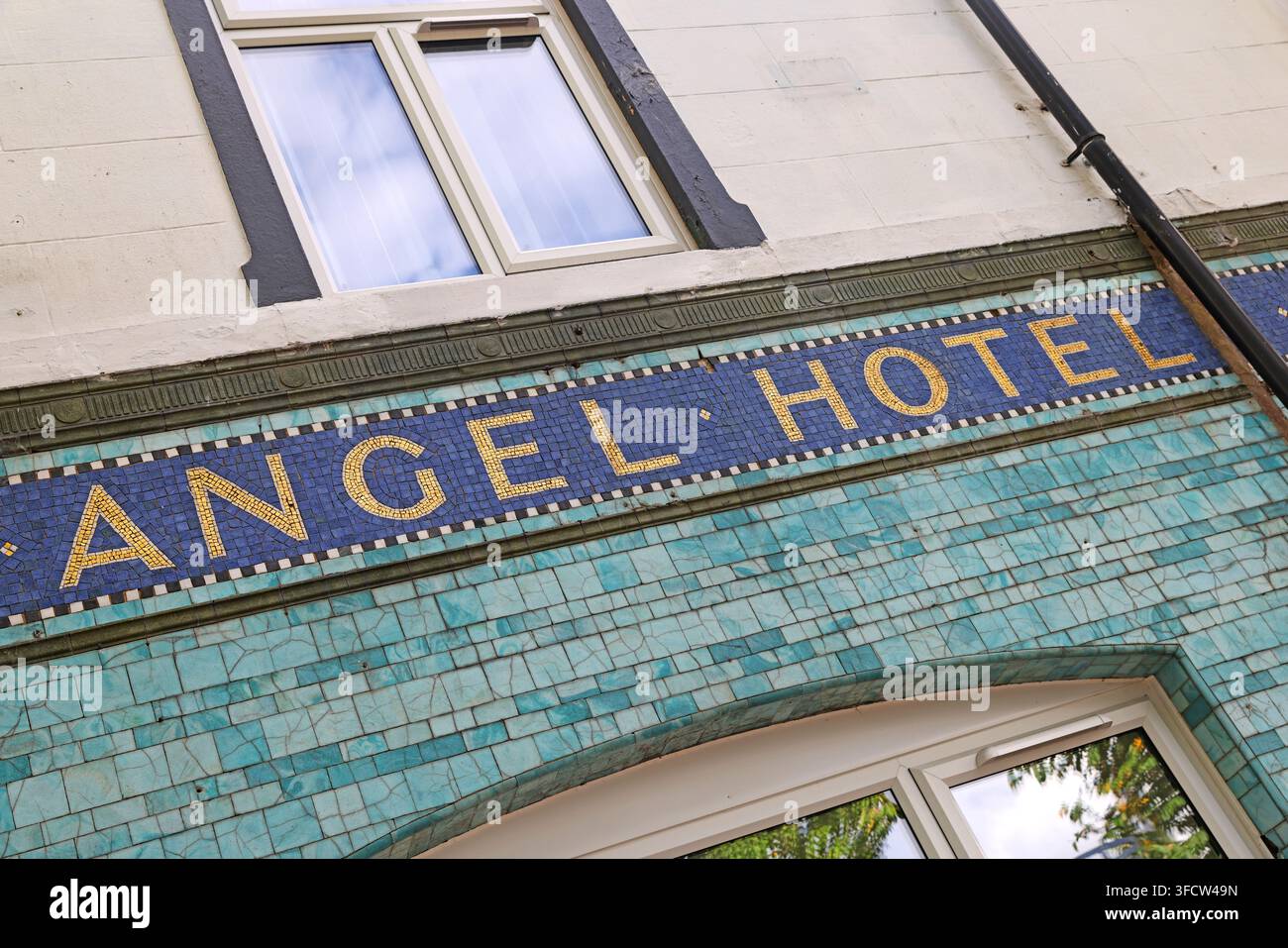 Close detail of “ANGEL HOTEL” glazed-tile lettering on the former pub in Ashton-under-Lyne. Stock Photo