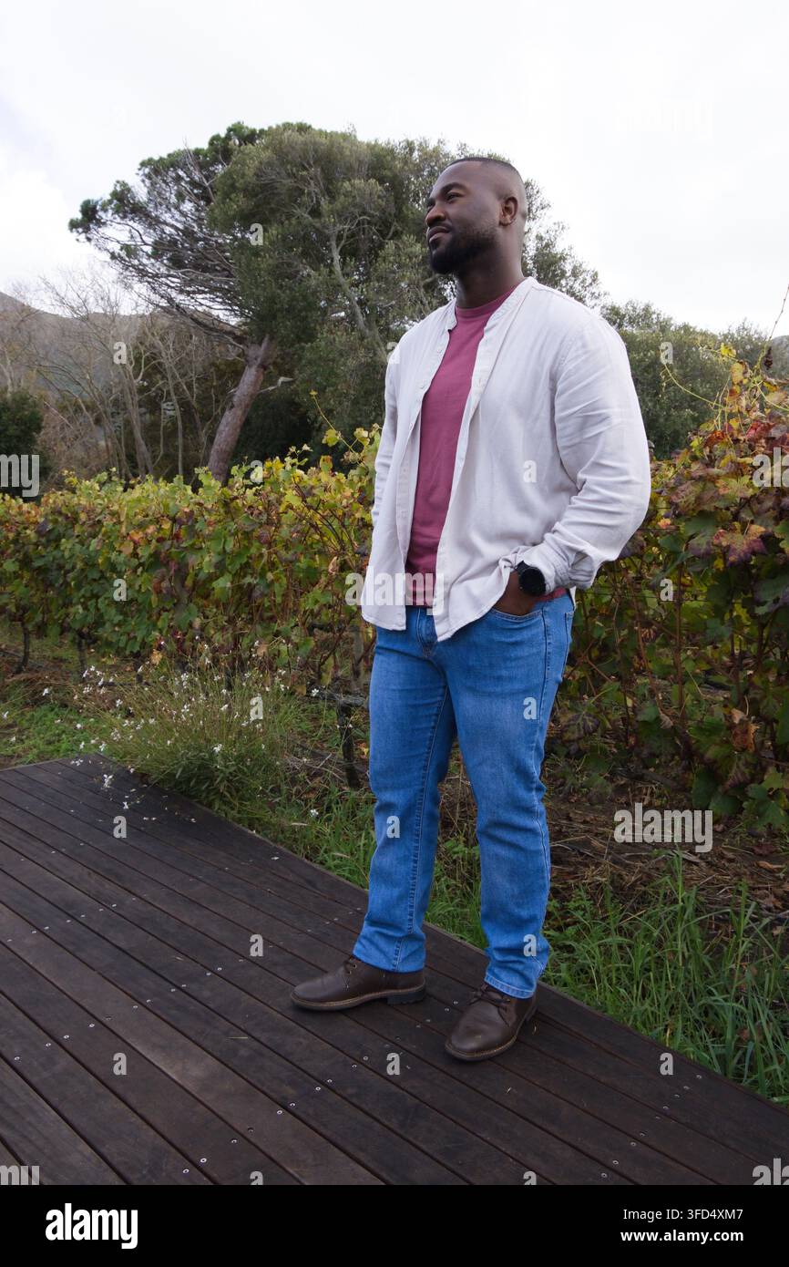 Maroom Man wearing maroon shirt hi-res stock photography and images - Alamy