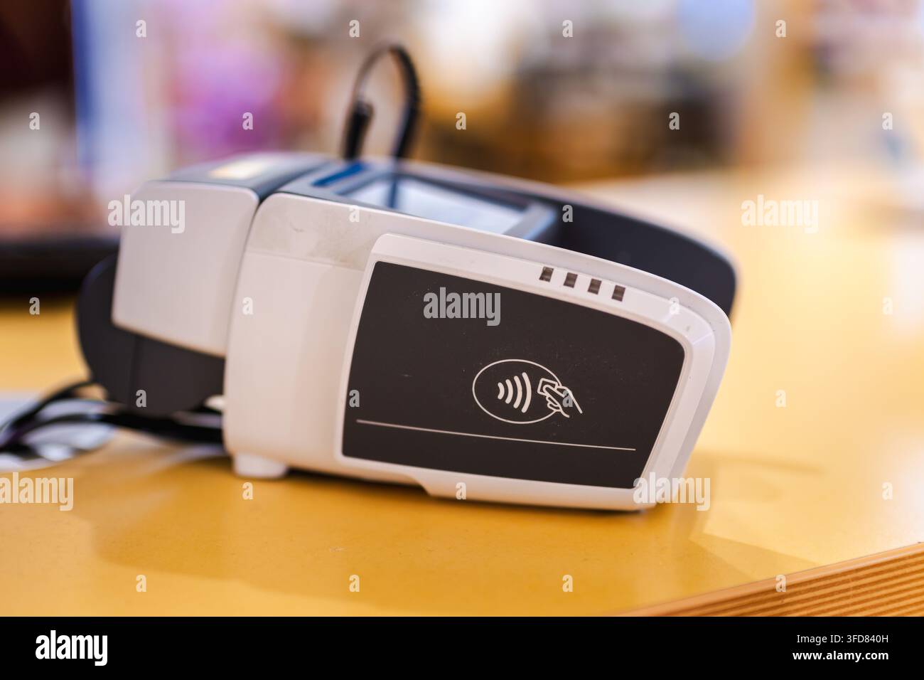Contactless Card Payment Terminal on Counter Stock Photo