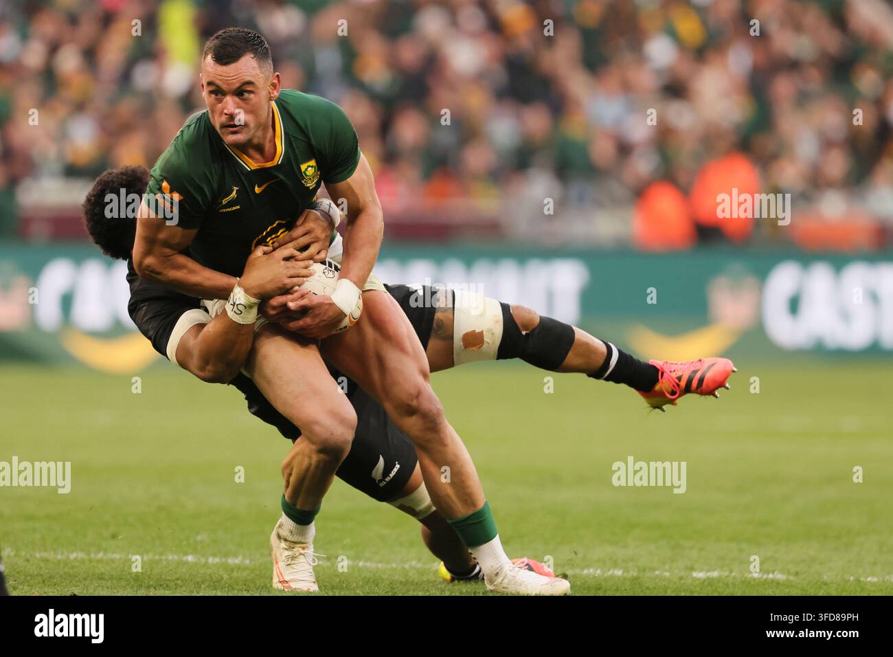 south-africa-s-jesse-kriel-front-is-tackled-from-behind-by-new