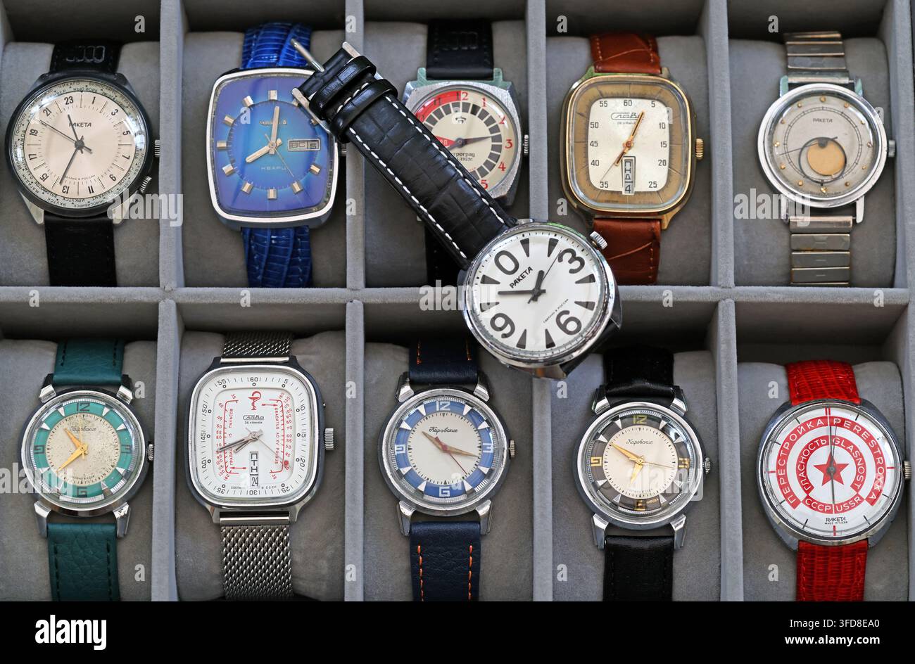 Mixed display of vintage Soviet wristwatches from the USSR, including distinctive medical and graphic dials. Stock Photo