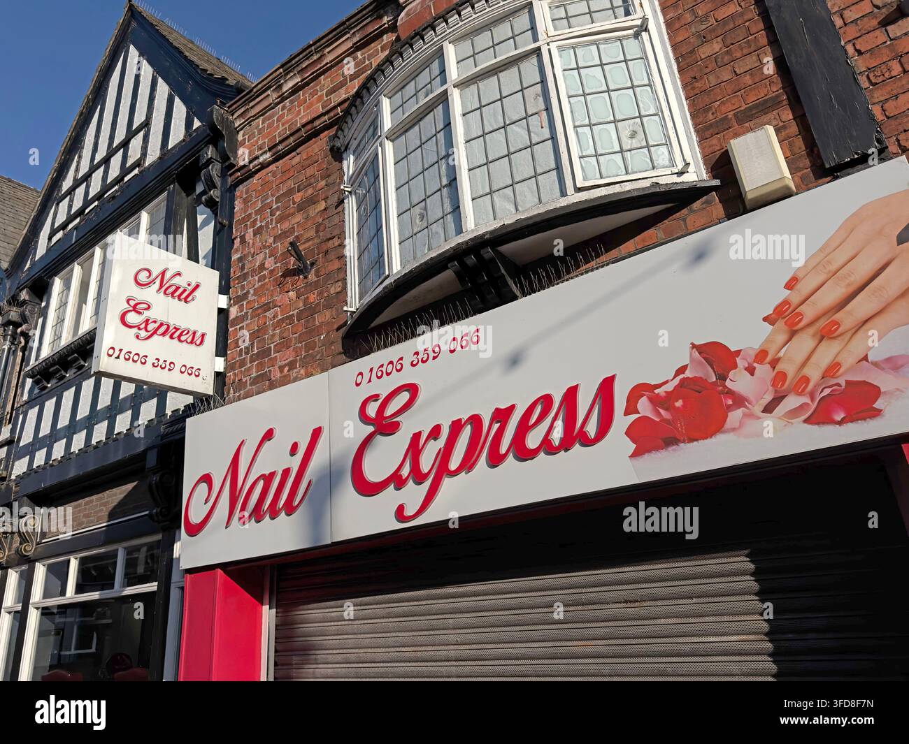 Nail Express salon trading from a historic black-and-white building on Witton Street, Northwich. Stock Photo