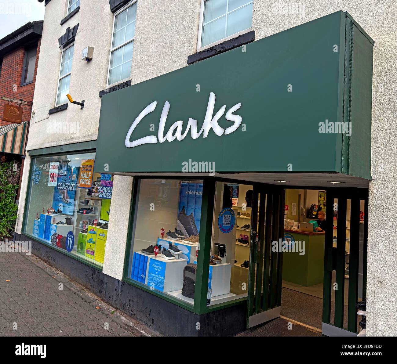 Clarks shoe shop on London Road in Stockton Heath, Warrington. Stock Photo