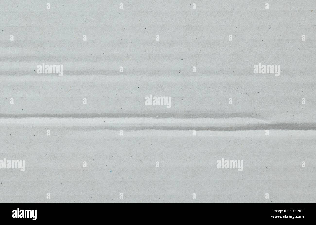 White cardboard surface showing textured pattern and horizontal lines Stock Photo