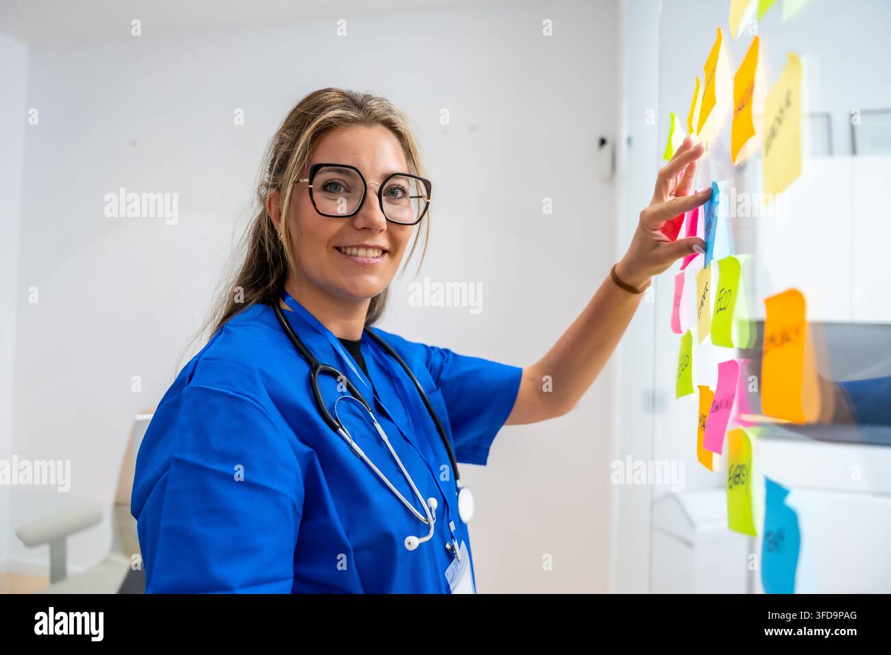 Medical professional collaborating on healthcare concepts with sticky notes Stock Photo