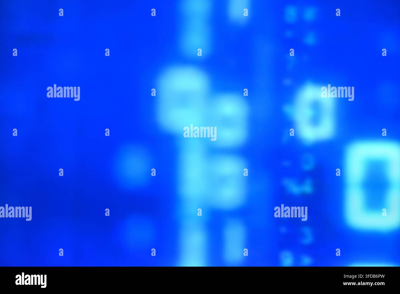 blurry binary number system on blue computer screen background and texture Stock Photo