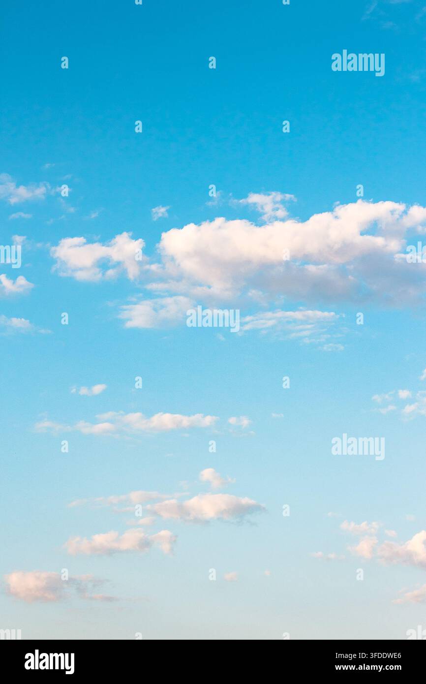 tranquil weather background. nature with fluffy clouds on the blue sky. atmospheric morning wallpaper Stock Photo
