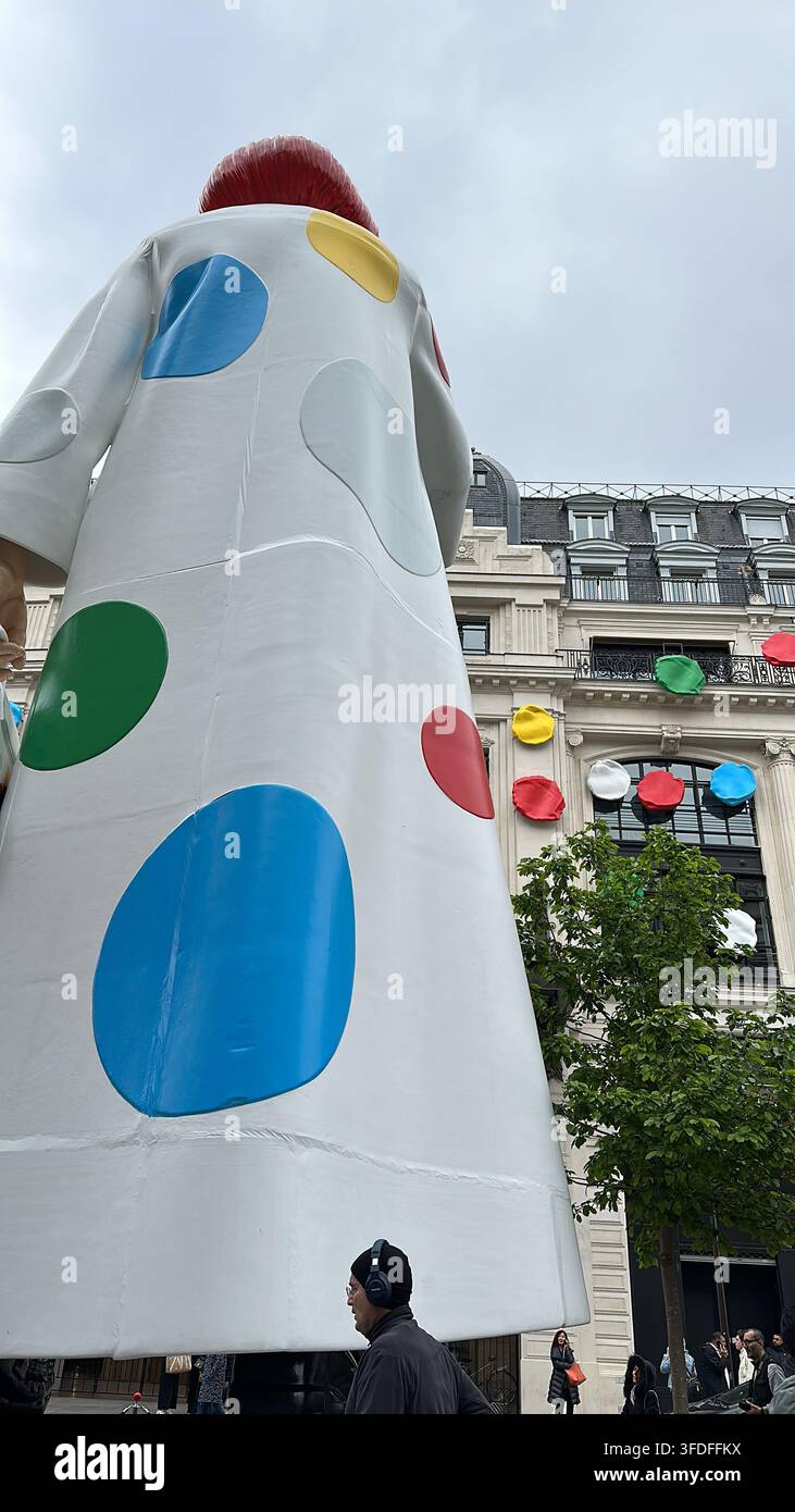Giant Yayoi Kusama statue sculpture outside Louis Vuitton headquarters near La Samaritaine and Cheval Blanc hotel on Rue du Pont Neuf in Paris. - Smartphone Captured Stock Image
