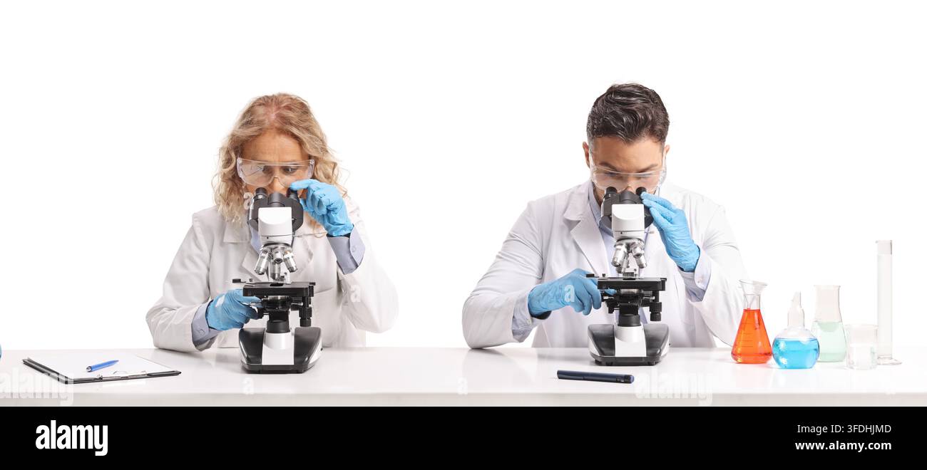 Scientists working with microscopes isolated on white background Stock Photo
