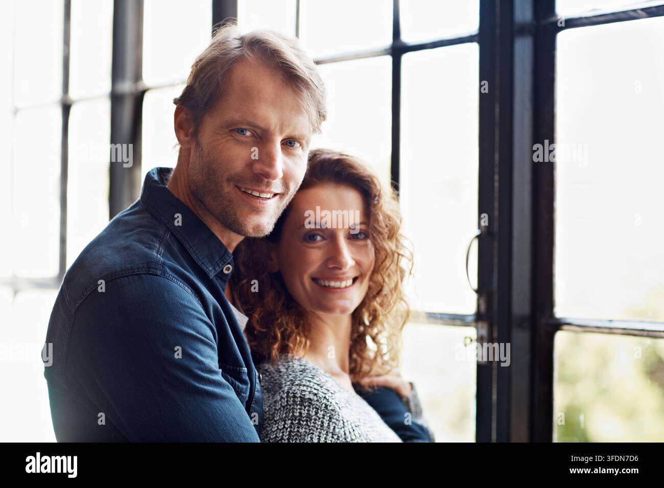 hug-portrait-and-smile-with-couple-in-home-for-bonding-marriage