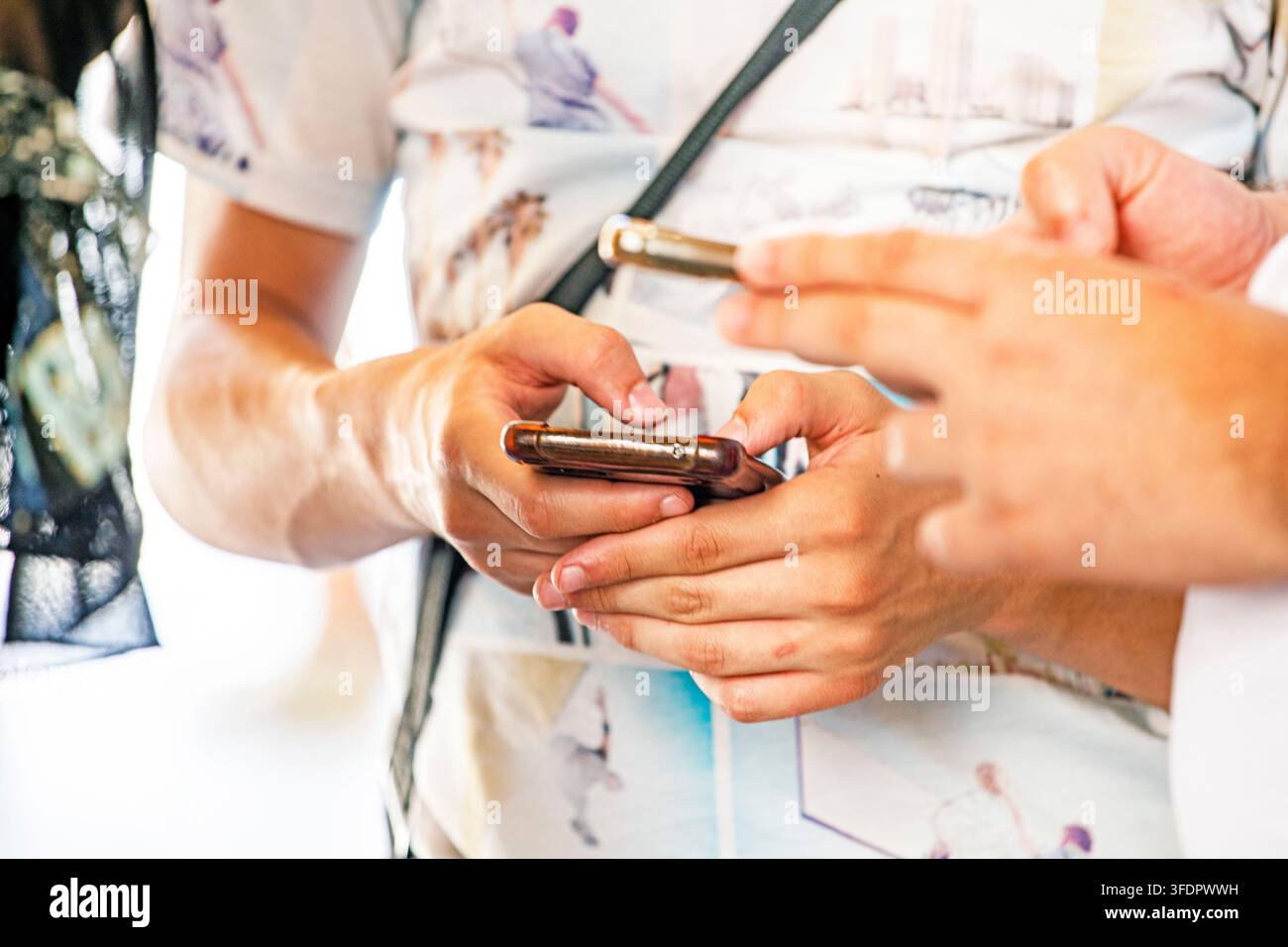 Exchange information between phones. Technologies and capabilities Stock Photo