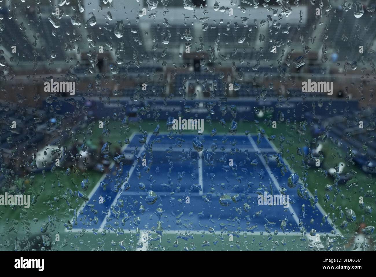The Grandstand stadium sits empty during a rain delay at the U.S. Open ...