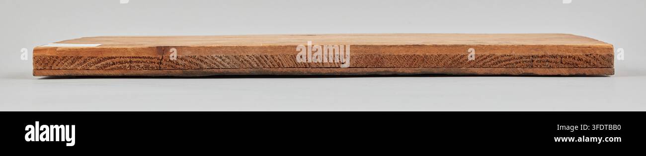 A rectangular wooden block, shown in side profile and top edge, created ...