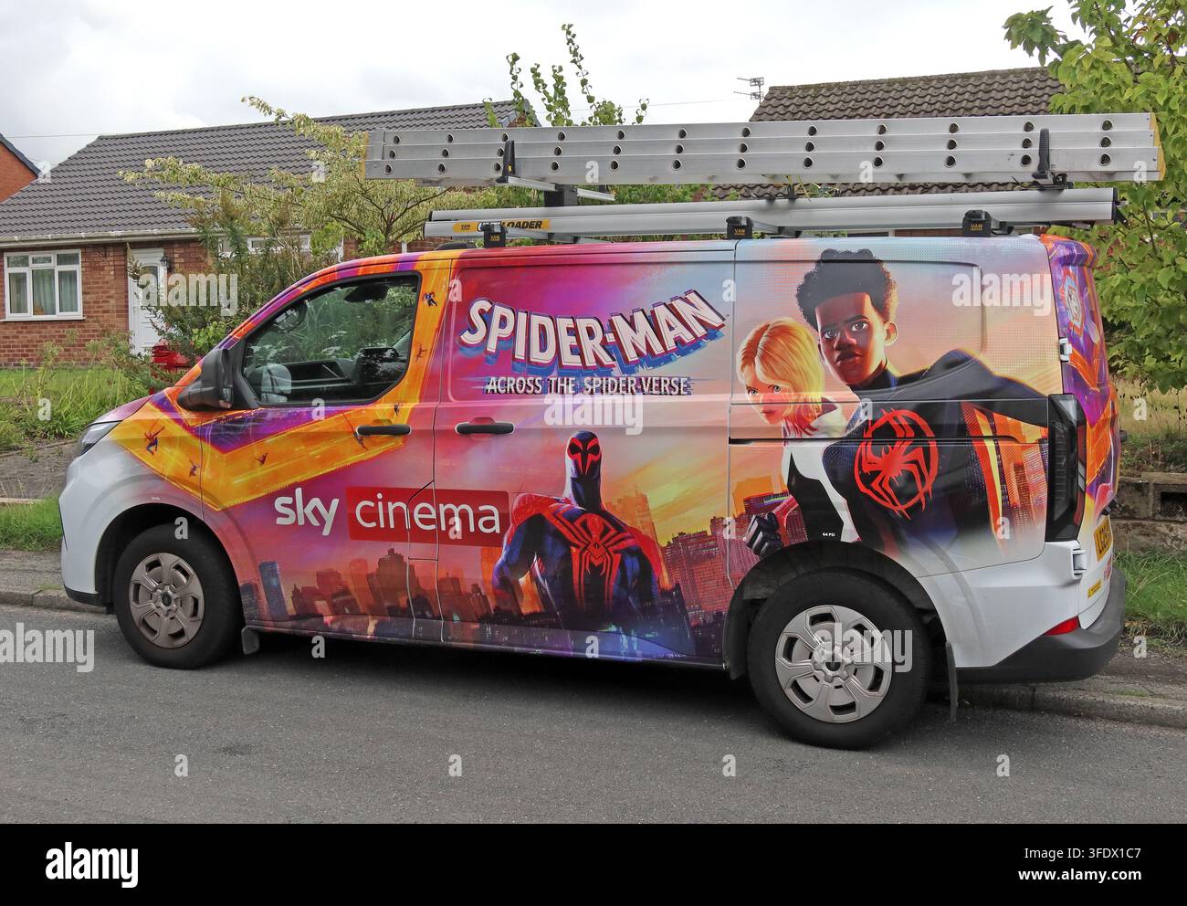 Sky engineer service van branded with Spider-Man movie artwork, broadband, cinema and on-demand TV advertising Stock Photo