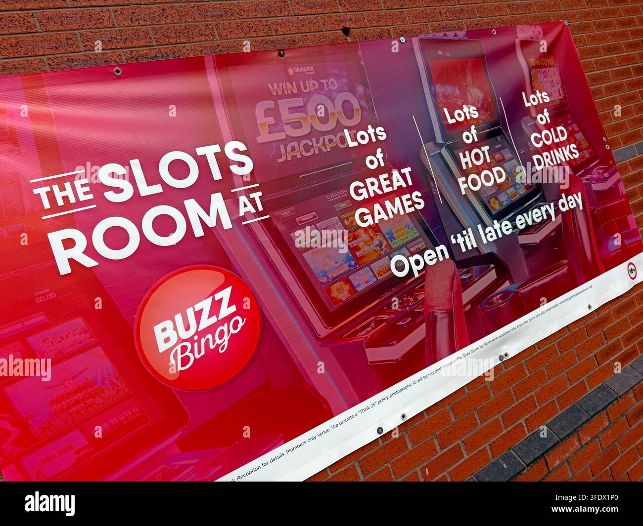 Buzz Bingo slots room advertising jackpot games, food and drinks at a British bingo venue Stock Photo
