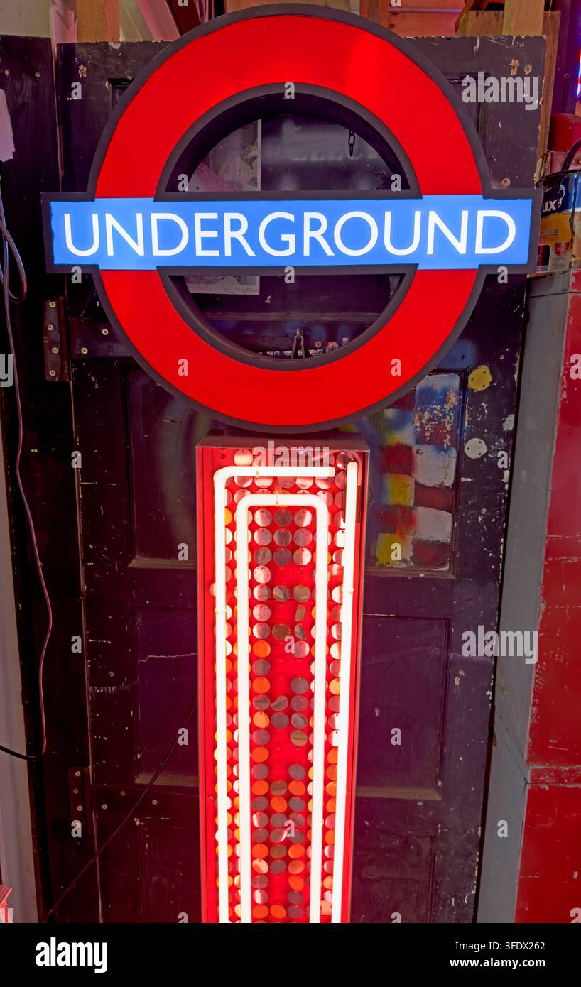 London Underground roundel rendered as a bright red, blue and white neon sign Stock Photo