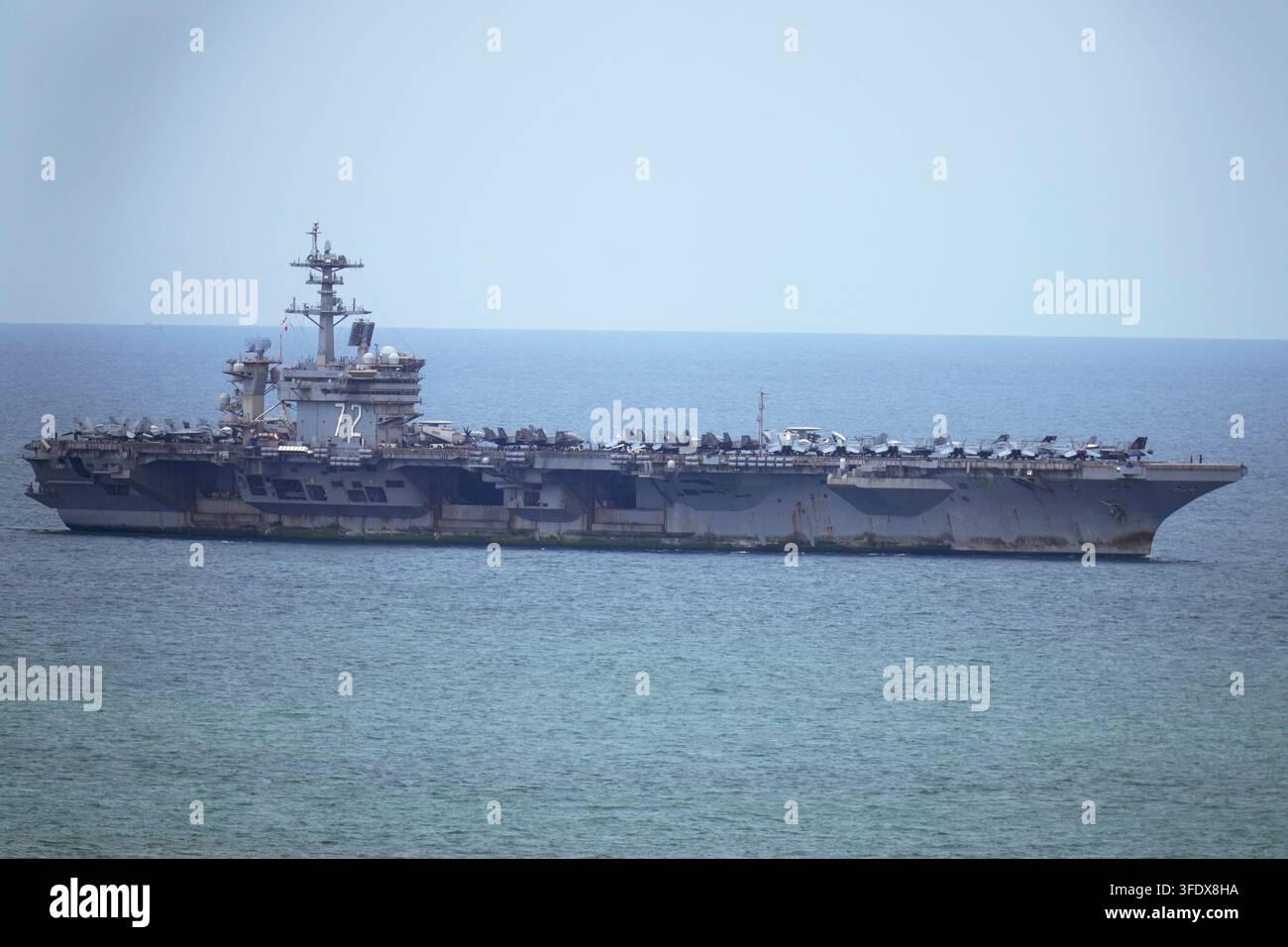 The U.S. Navy aircraft carrier USS Abraham Lincoln arrives at the port ...