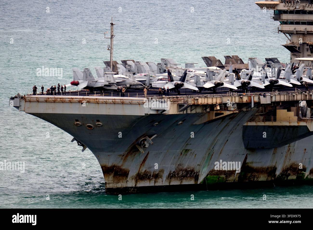 The U.S. Navy aircraft carrier USS Abraham Lincoln arrives at the port ...
