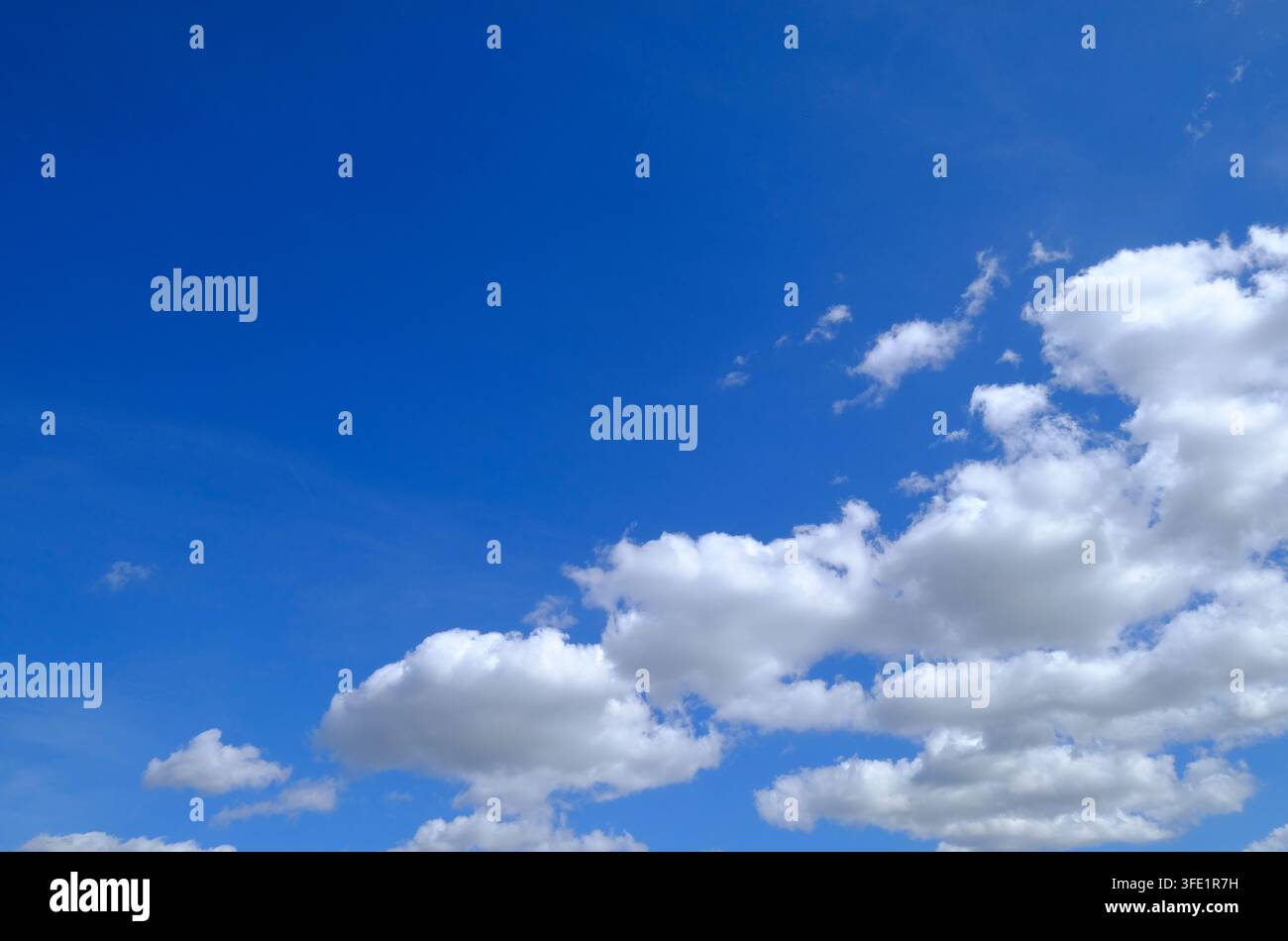 white clouds on bright blue sky background Stock Photo