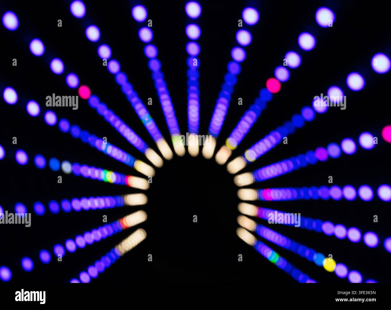 Blue neon lights in tunnel Stock Photo