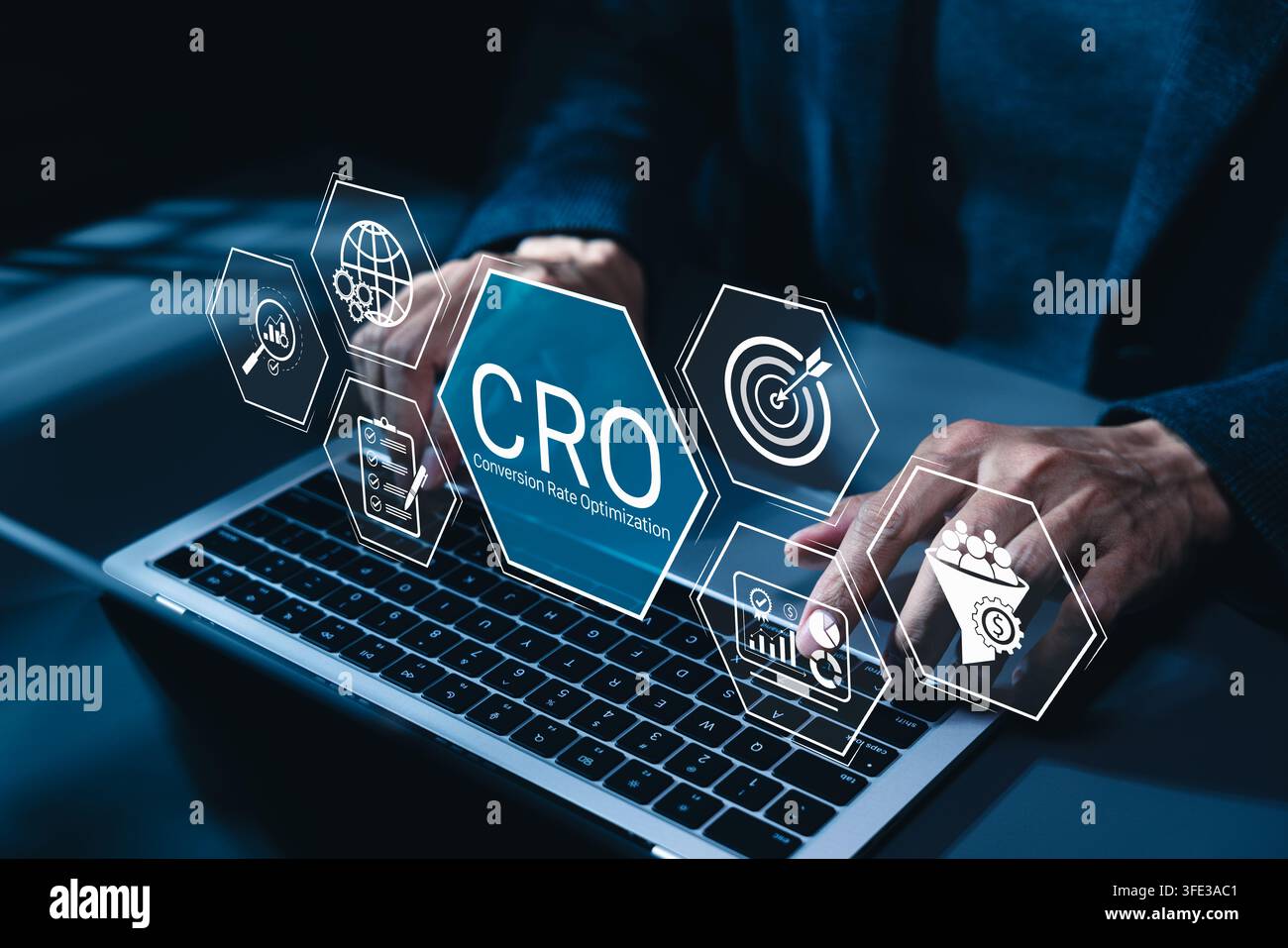 CRO, conversion rate optimization technology concept. Businessman using laptop with CRO related technology icons, symbolizing conversion rate optimiza Stock Photo