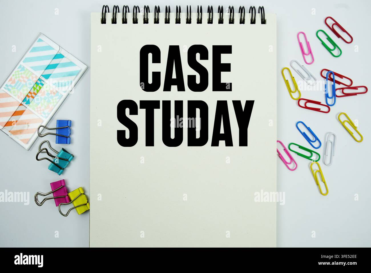 Case Study text message written on notepad with stationery flat lay on white background Stock Photo