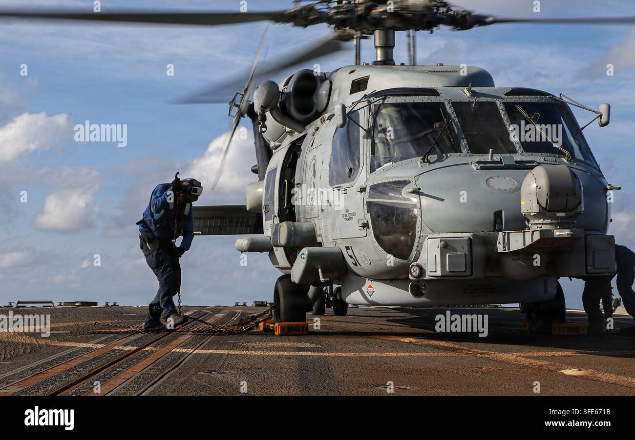 U.S. Navy Boatswain’s Mate Seaman Cody Martinez removes chock and ...