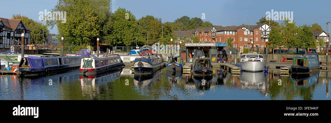 Northwich Marina on the River Weaver with narrowboats and moored craft on a sunny day. Stock Photo