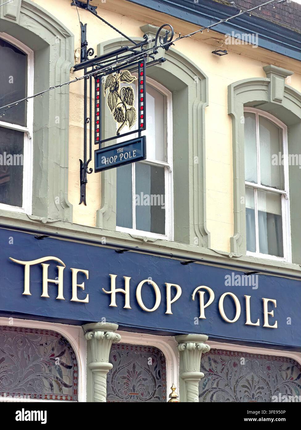 The Hop Pole pub sign on Buttermarket Street, Warrington town centre, Cheshire. Stock Photo