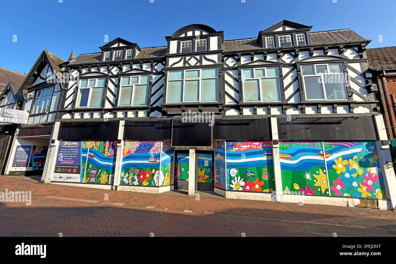 Large historic black-and-white shop block standing empty in Northwich town centre, Cheshire. Stock Photo