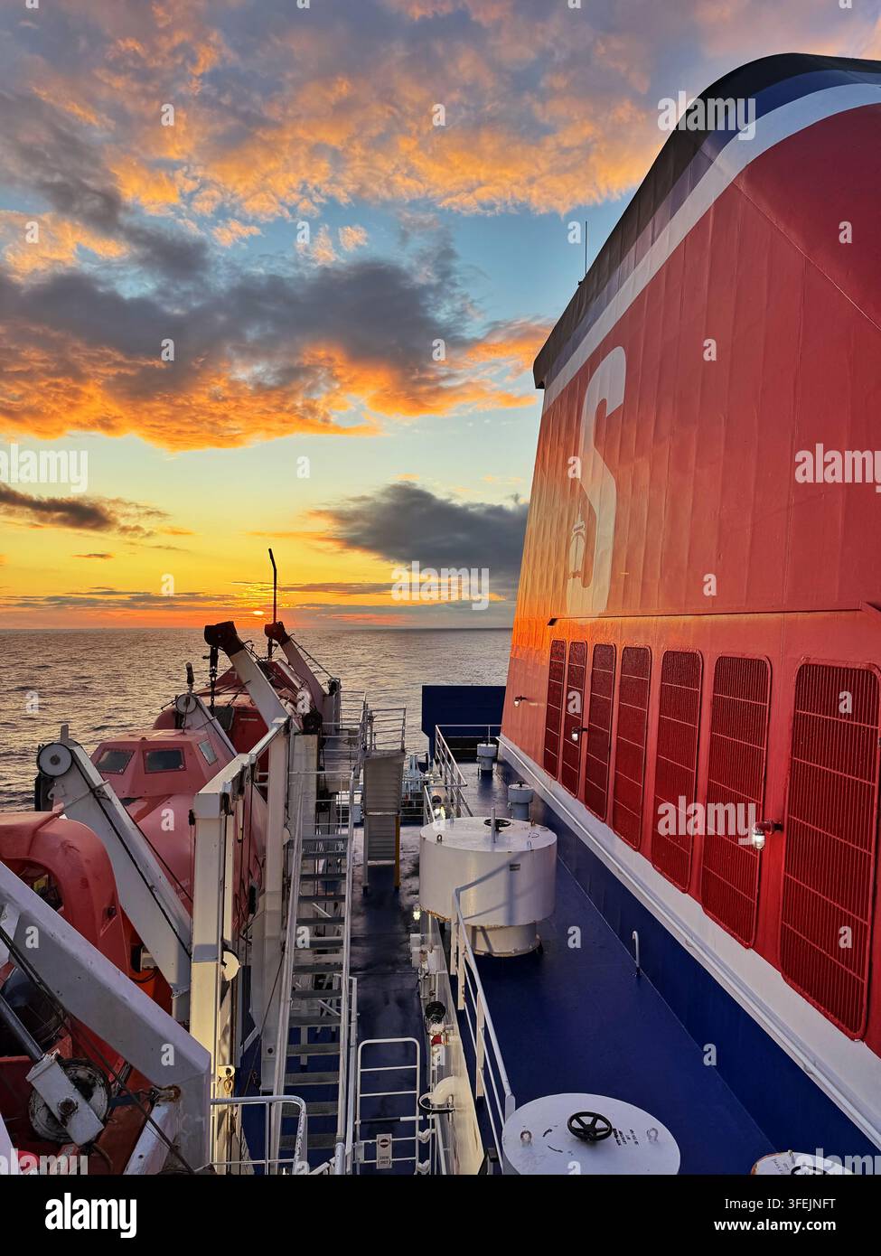 Sunset as seen from a Stena line ferry leaving Rosslare for Fishguard. - Smartphone Captured Stock Image