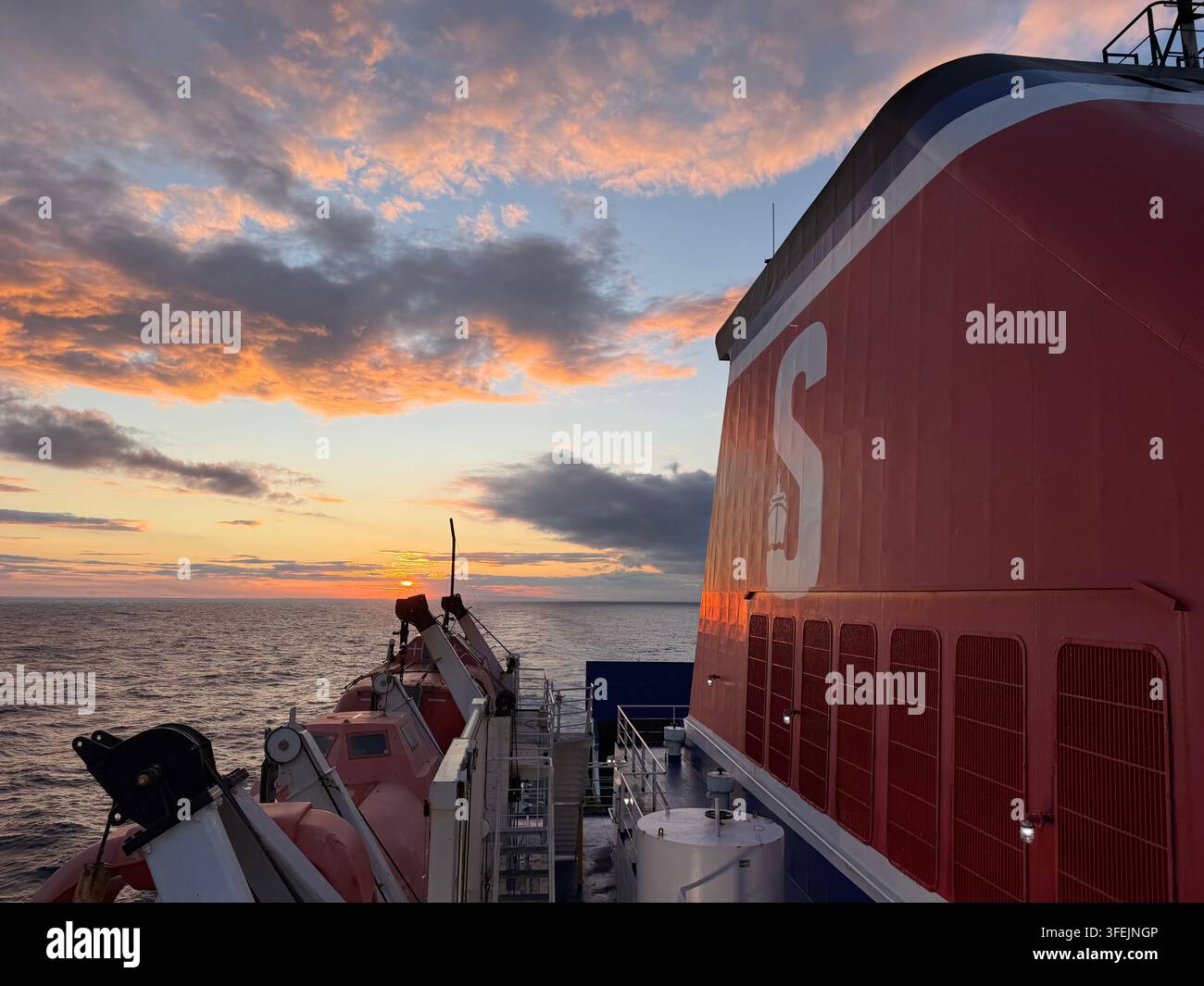 Sunset as seen from a Stena line ferry leaving Rosslare for Fishguard. - Smartphone Captured Stock Image