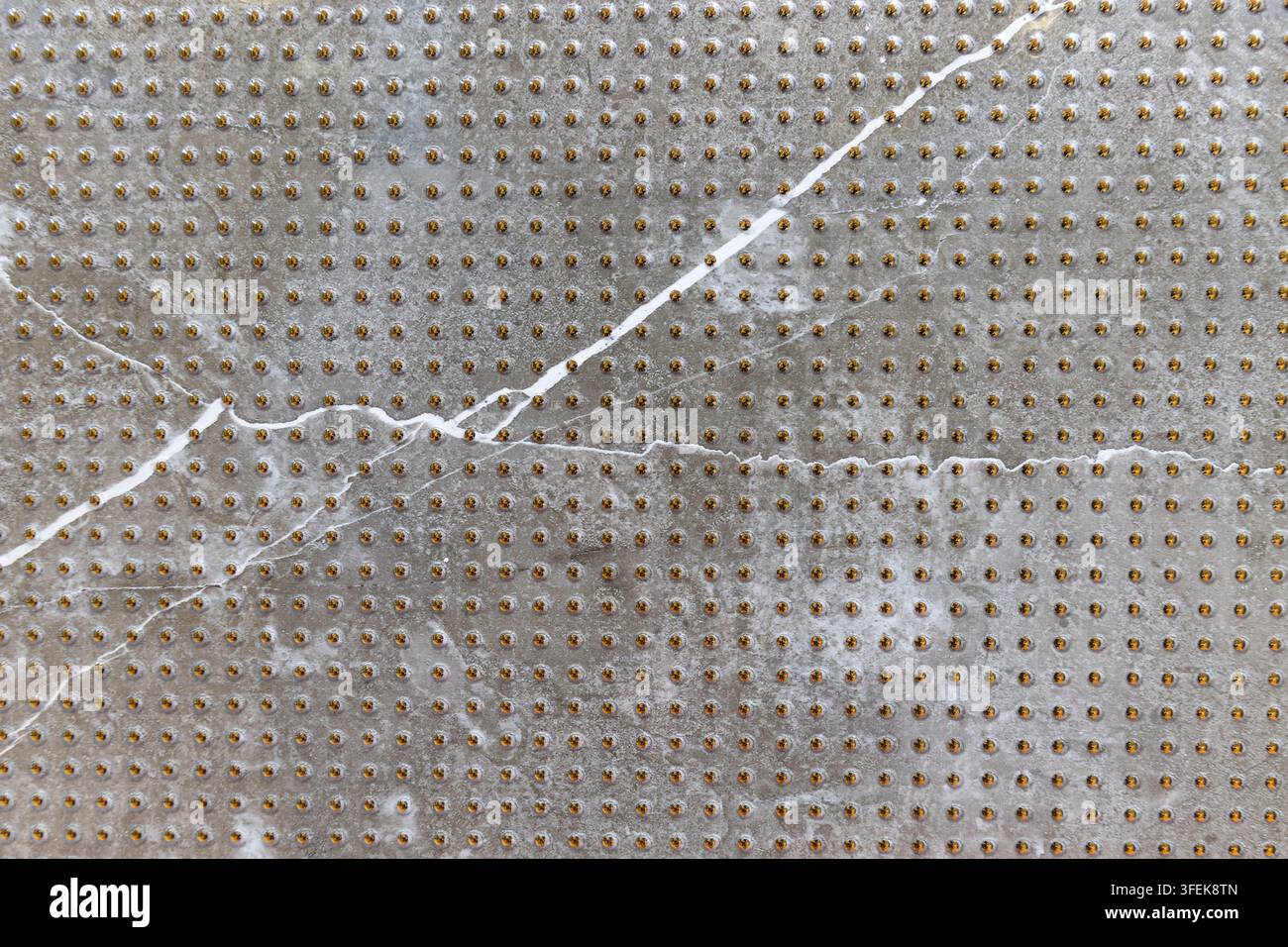 Textured grey stone tile surface with white veins Stock Photo