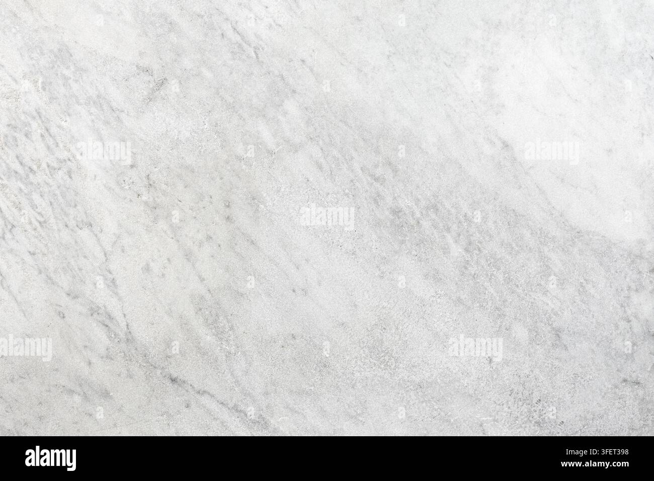 White marble surface displaying natural patterns and texture Stock Photo