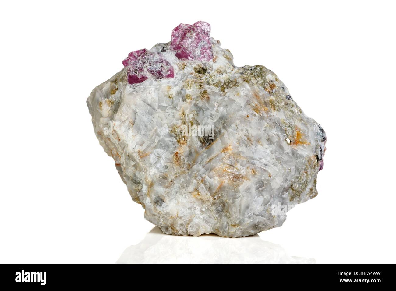 Macro mineral stone Ruby in rock on white background close up Stock Photo
