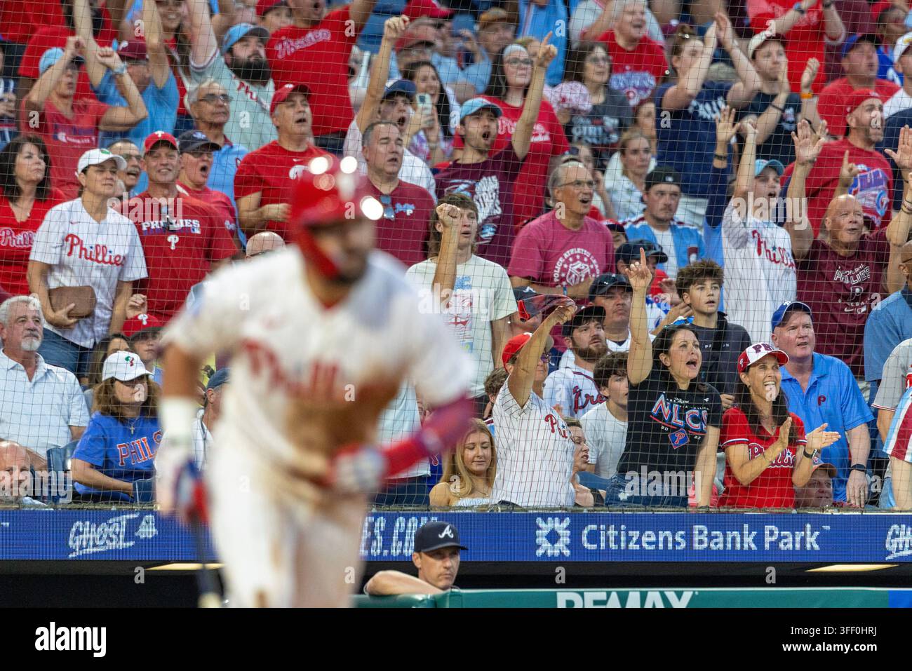 Fans react after Philadelphia Phillies designated hitter Kyle Schwarber