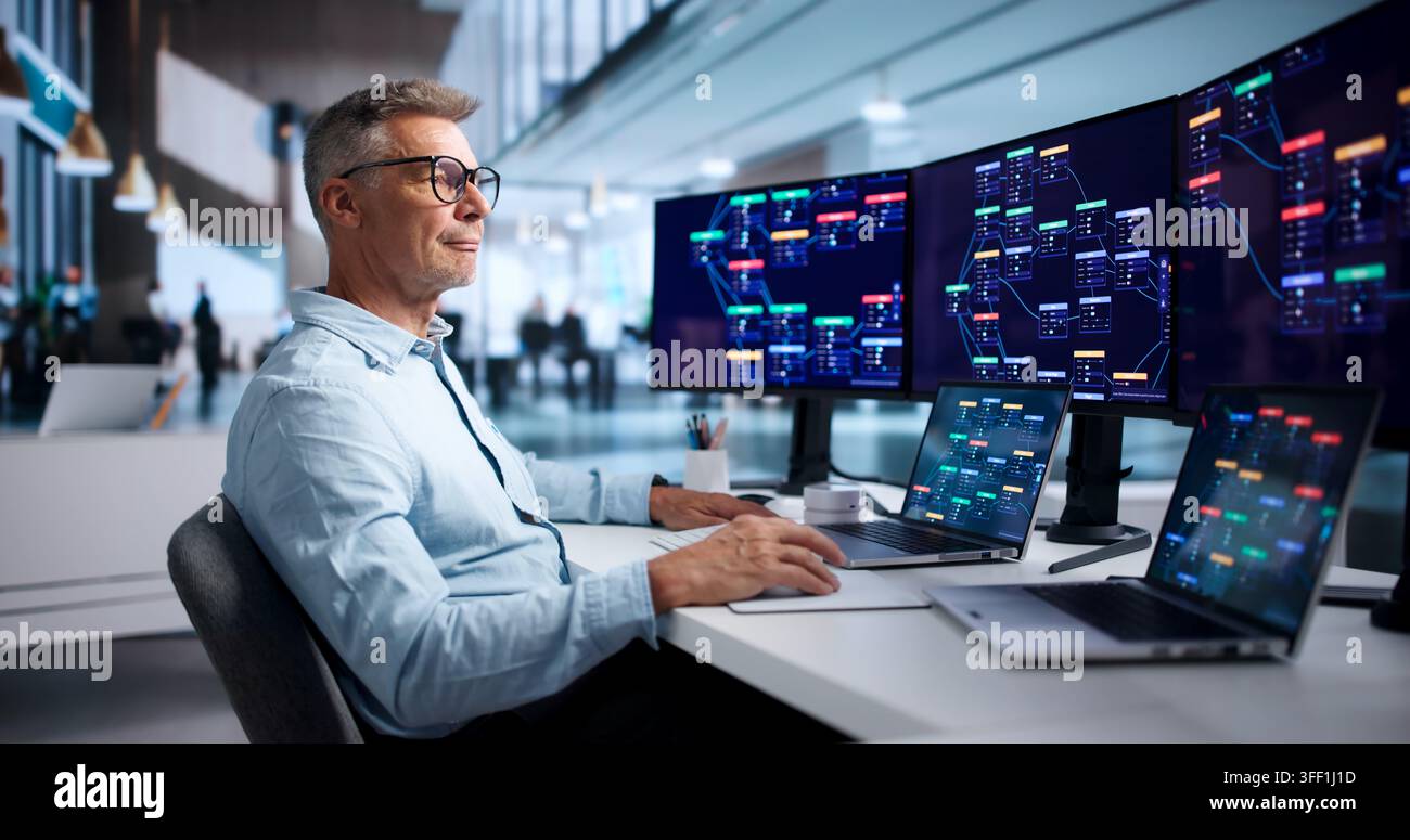 Software Engineer Rapidly Builds Business Applications Using Low-code Platform And Laptop. Stock Photo