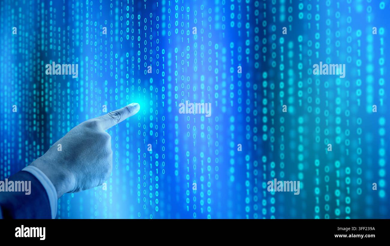 A hand pointing at a glowing blue digital screen filled with binary code, representing cyber security and data analysis. Concept of programming or tec Stock Photo