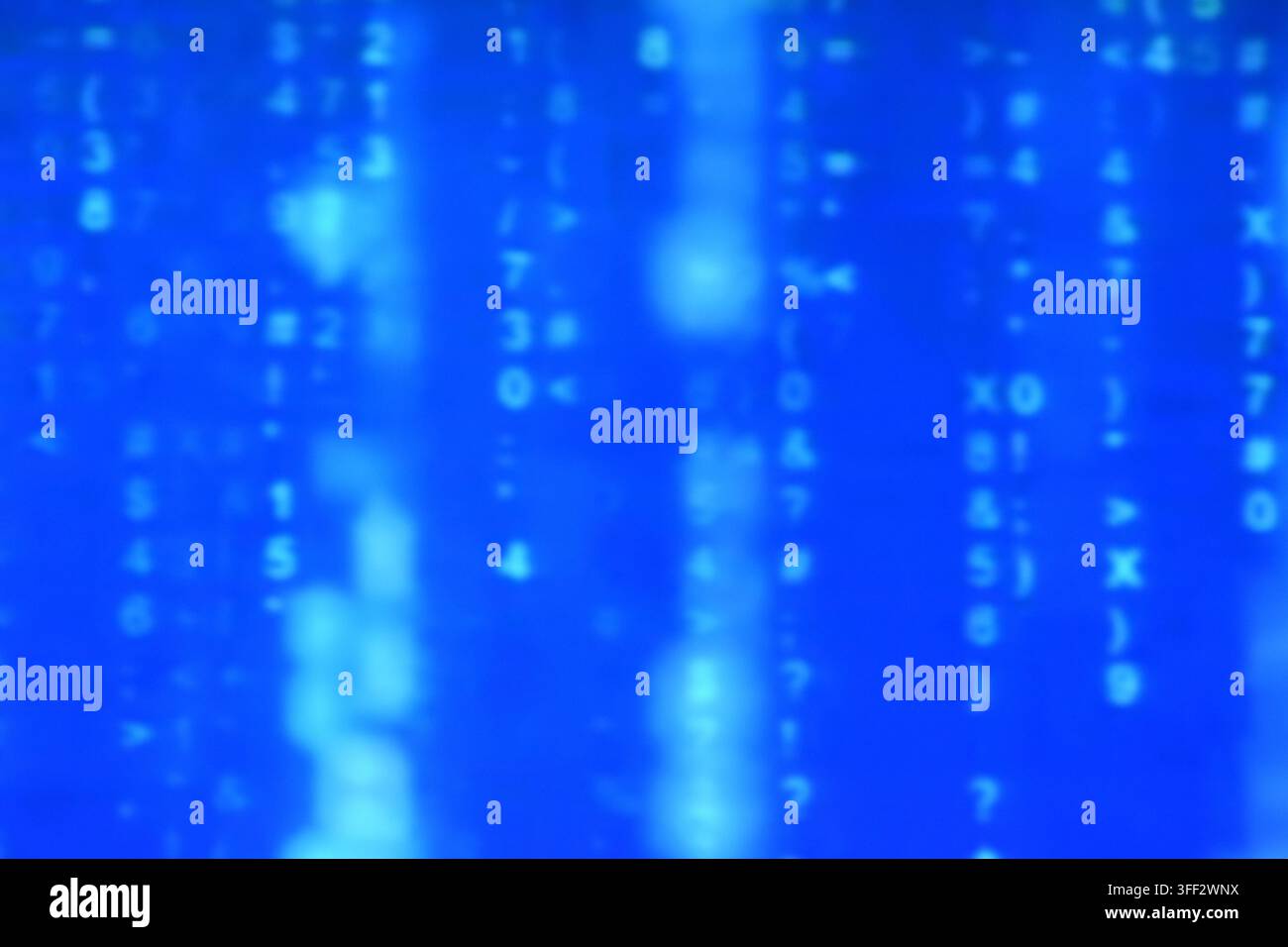 blurry binary number system on blue computer screen background and texture Stock Photo