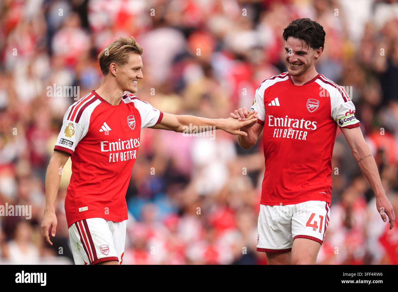 arsenal-s-declan-rice-right-celebrates-with-team-mate-martin-odegaard