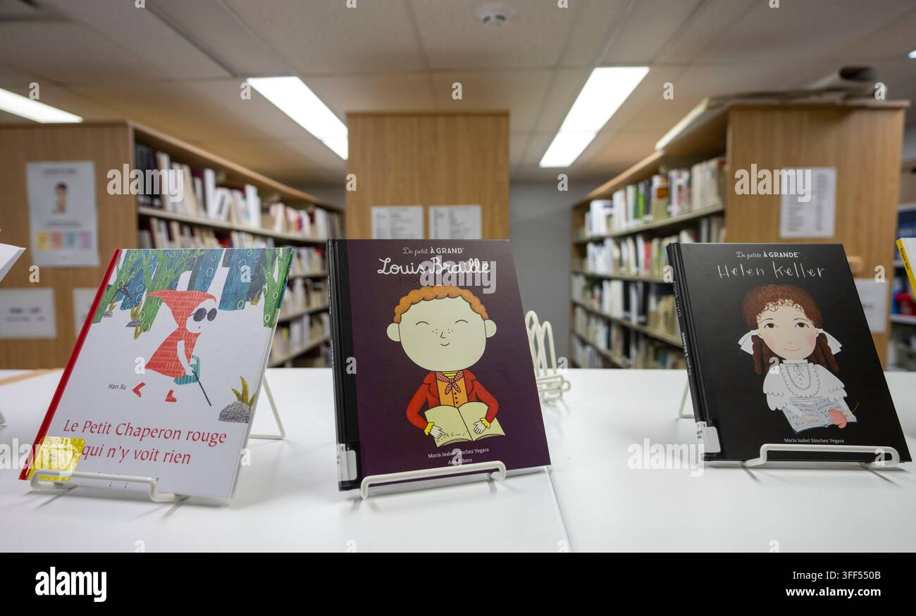 Books are on display at the library of the Jacques-Ouellette School, a ...