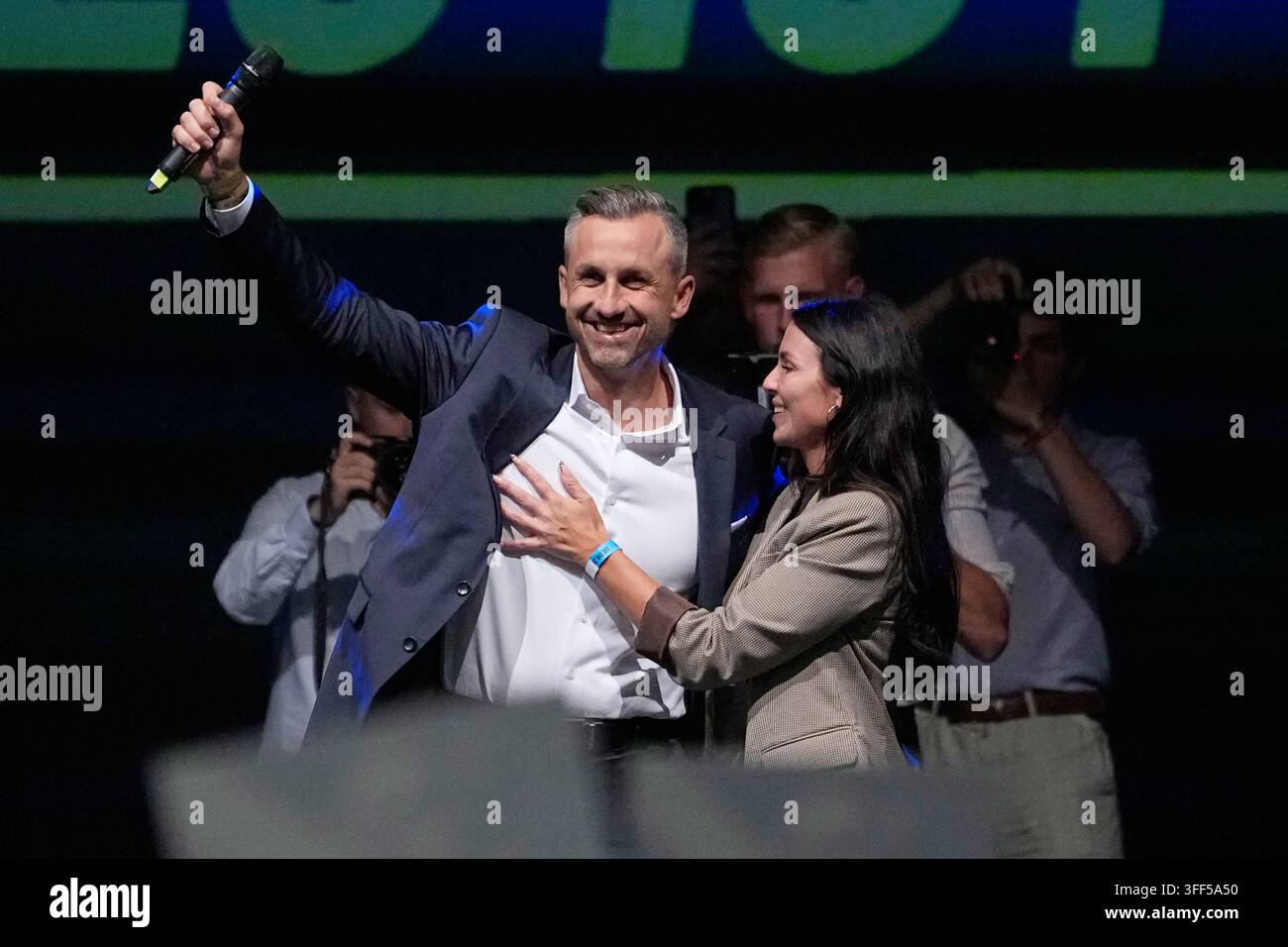 top-candidate-ulrich-siegmund-celebrates-with-his-wife-julia-at-an