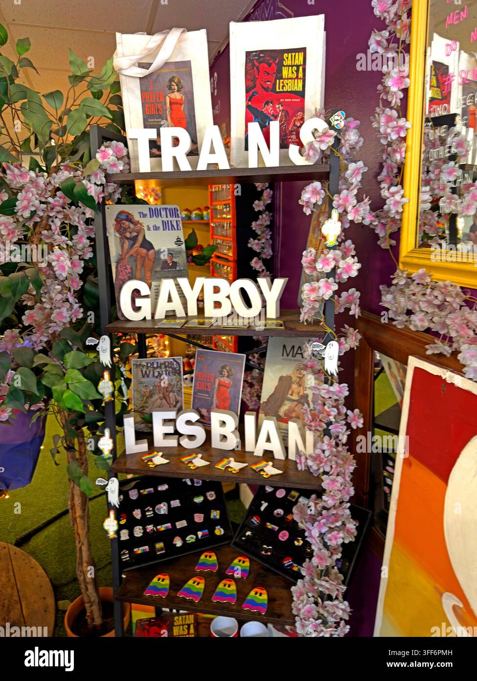 LGBTQ+ merchandise inside This Shop Is So Gay in York, including trans, gay and lesbian themed gifts and pride products. Stock Photo
