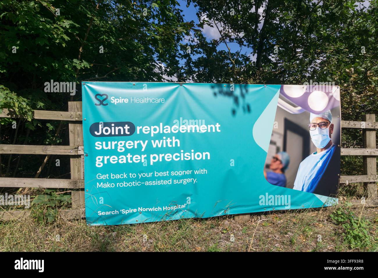 A poster advertising Spire Healthcare, outside Spire Norwich Hospital. Stock Photo