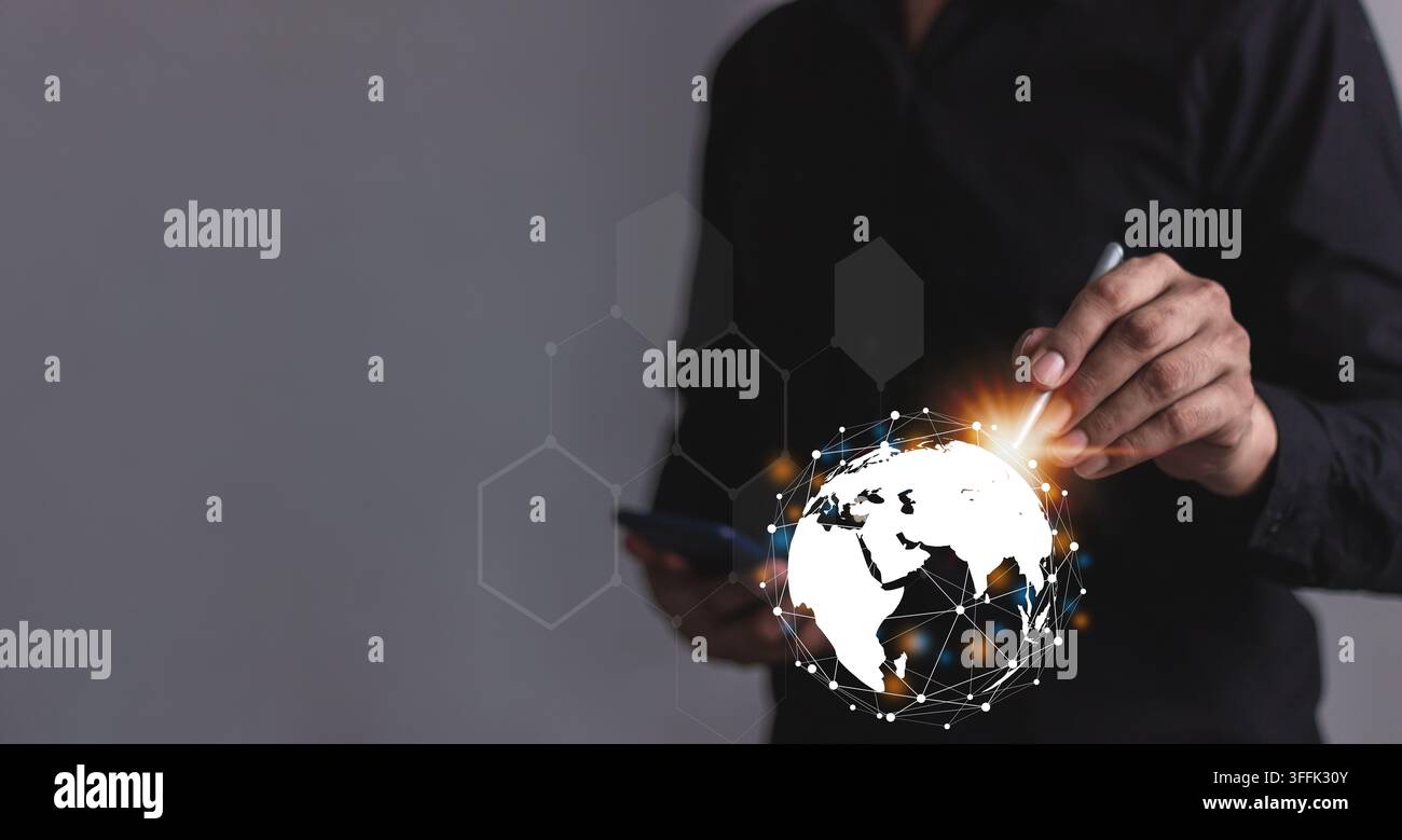 Young man using smartphone hand interacting with futuristic digital interface symbolizing innovation and progress. Stock Photo