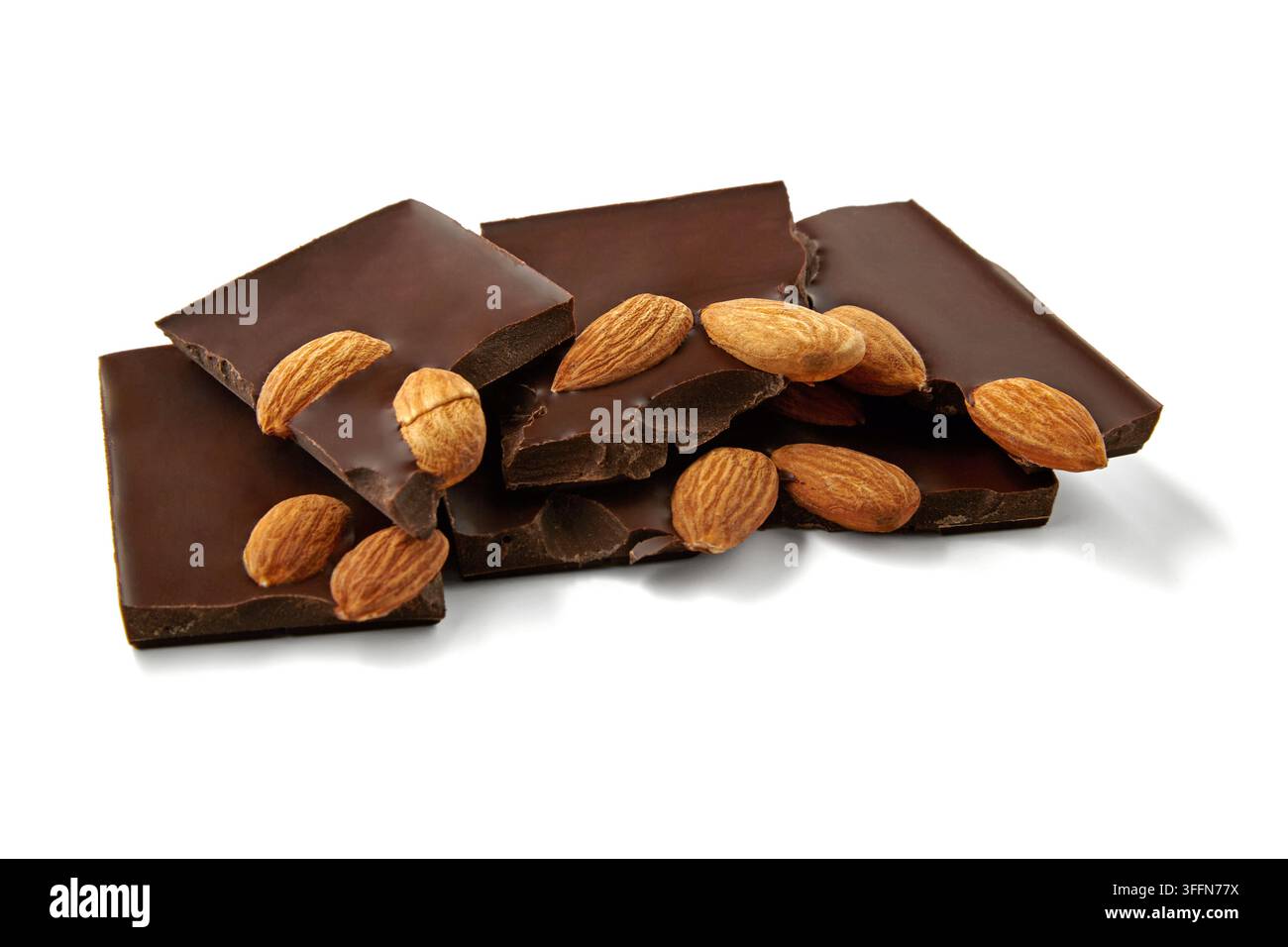 Broken Dark Chocolate Bars with Whole Almonds on White Stock Photo