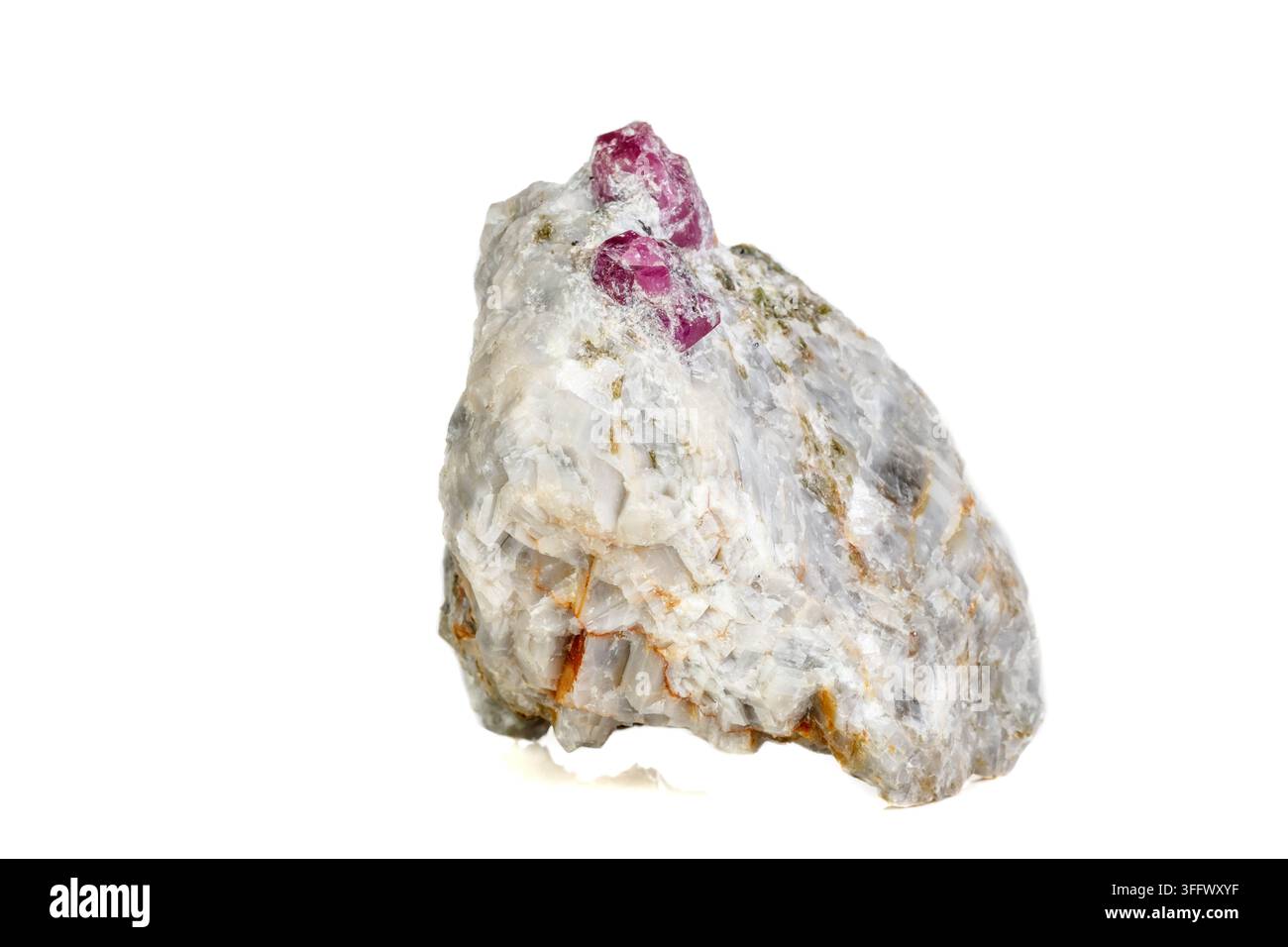 Macro mineral stone Ruby in rock on white background close up Stock Photo