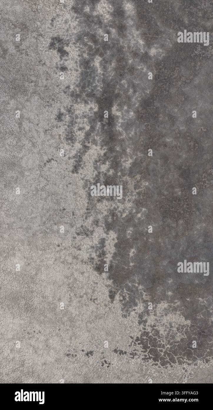 Aerial view of a textured gray concrete surface with weathered patterns and subtle variations in tone Longmont, Colorado, United States. Stock Photo