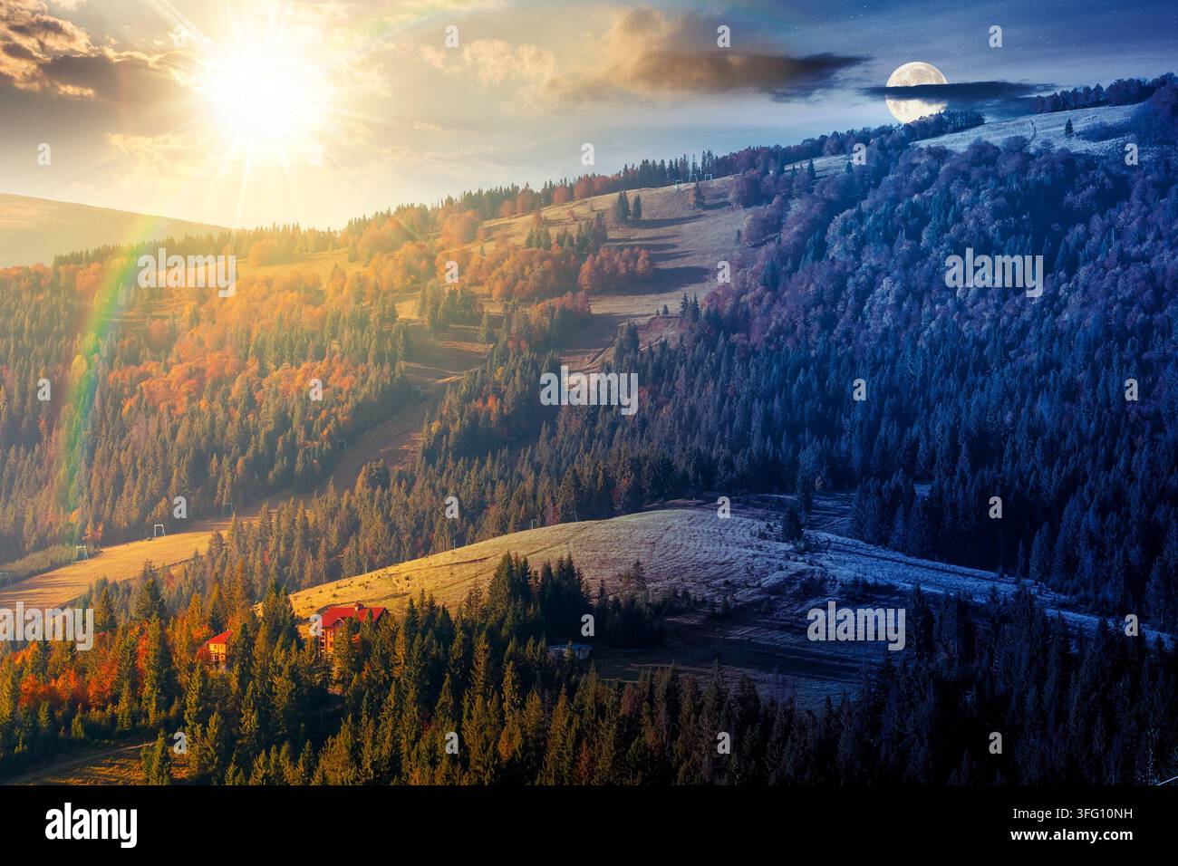 mountainous rural landscape of ukraine in autumn. day meet night. sun and moon over picturesque highland woods. grassy meadow. carpathian countryside Stock Photo